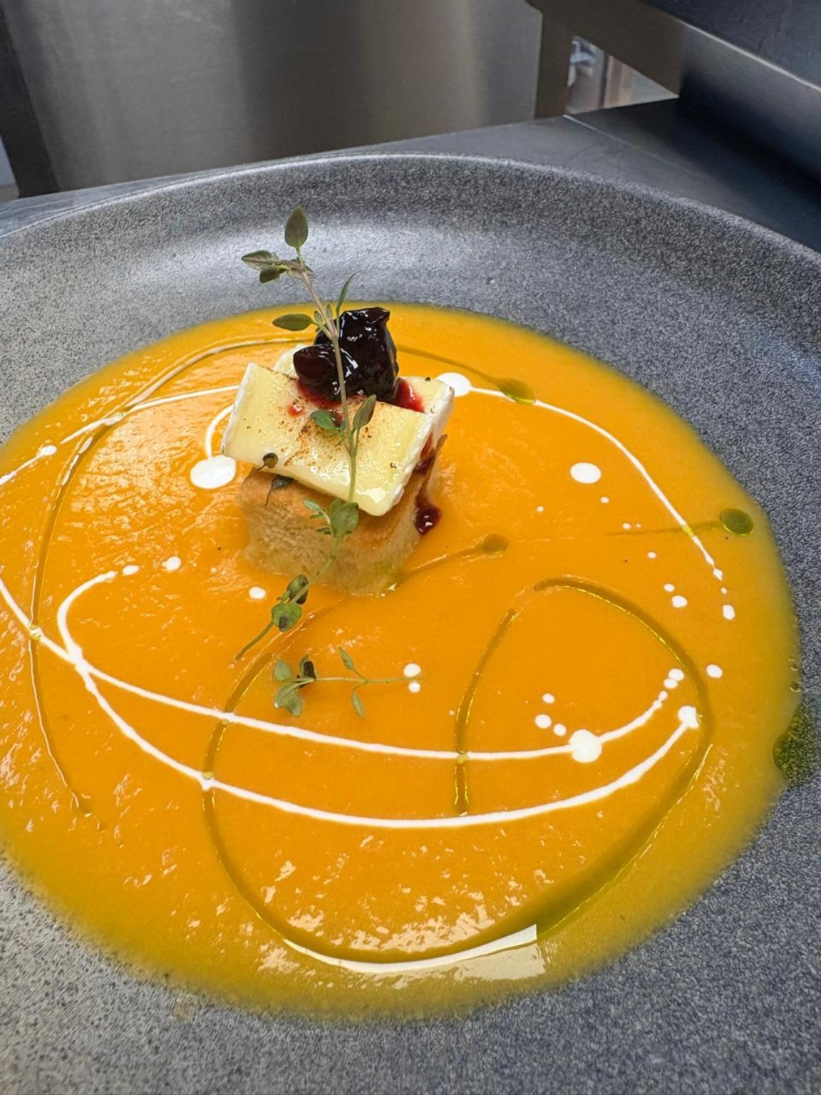 Pumpkin velouté with refined plating